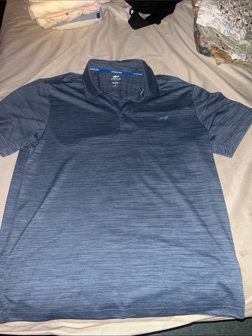Attack Life by Greg Norman Heathered Blue Performance Polo